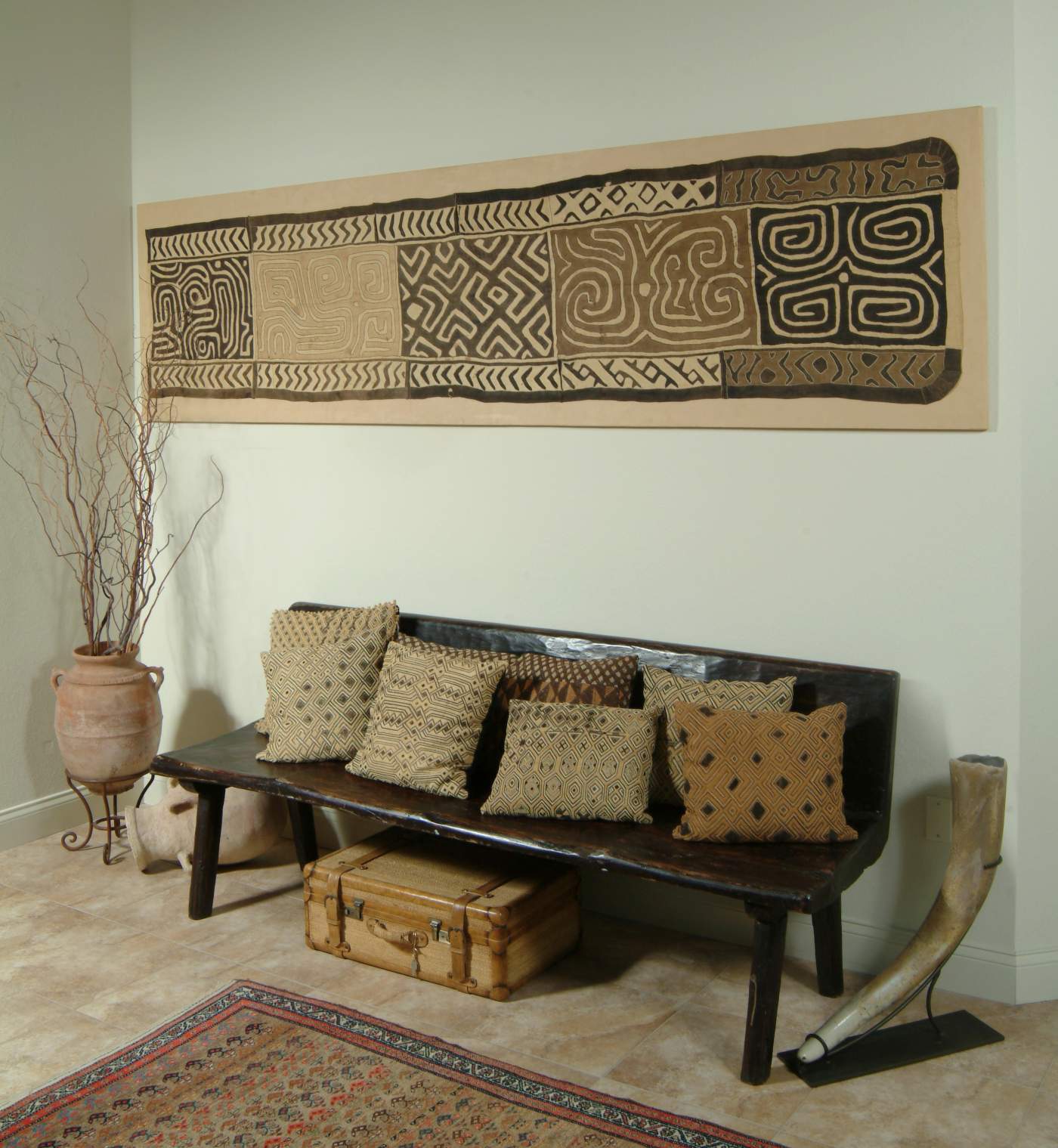 Entryway with pillows on bench