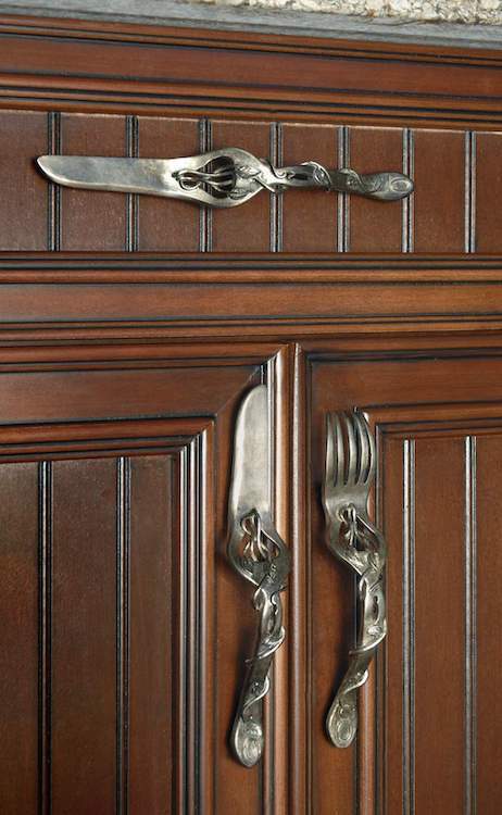 Kitchen handles in the shape of kitchen utensils