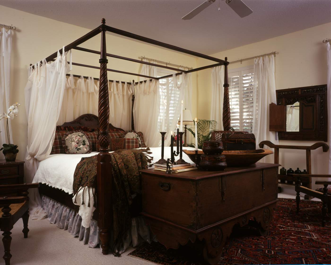 Master bedroom with chest in front of bed