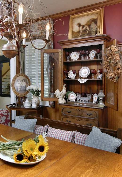 Vertical view of the china cabinet past the table
